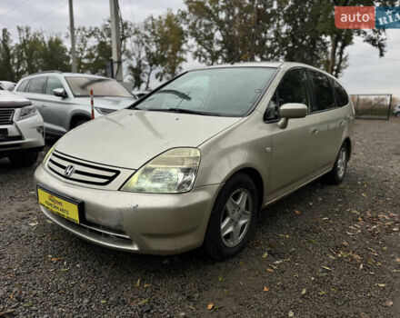 Жовтий Хонда Стрім, об'ємом двигуна 2 л та пробігом 320 тис. км за 3900 $, фото 1 на Automoto.ua