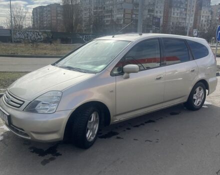 Желтый Хонда Стрим, объемом двигателя 2 л и пробегом 321 тыс. км за 3500 $, фото 1 на Automoto.ua