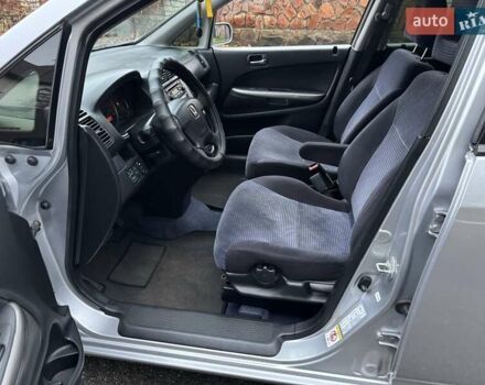 Сірий Хонда Стрім, об'ємом двигуна 2 л та пробігом 259 тис. км за 5500 $, фото 25 на Automoto.ua