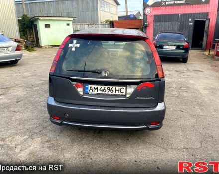 Серый Хонда Стрим, объемом двигателя 2 л и пробегом 350 тыс. км за 1850 $, фото 2 на Automoto.ua