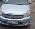 Серый Хонда Стрим, объемом двигателя 2 л и пробегом 213 тыс. км за 4100 $, фото 1 на Automoto.ua