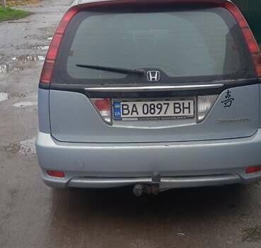 Серый Хонда Стрим, объемом двигателя 2 л и пробегом 213 тыс. км за 4100 $, фото 1 на Automoto.ua