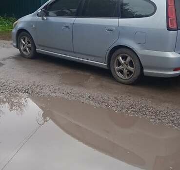 Серый Хонда Стрим, объемом двигателя 2 л и пробегом 213 тыс. км за 4100 $, фото 2 на Automoto.ua