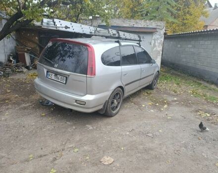 Серый Хонда Стрим, объемом двигателя 2 л и пробегом 450 тыс. км за 3650 $, фото 1 на Automoto.ua