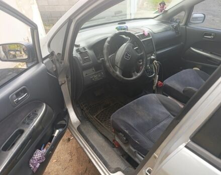 Серый Хонда Стрим, объемом двигателя 2 л и пробегом 450 тыс. км за 3650 $, фото 4 на Automoto.ua