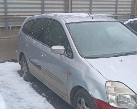 Сірий Хонда Стрім, об'ємом двигуна 2 л та пробігом 340 тис. км за 4300 $, фото 1 на Automoto.ua