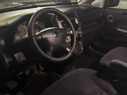 Серый Хонда Стрим, объемом двигателя 2 л и пробегом 300 тыс. км за 4000 $, фото 1 на Automoto.ua