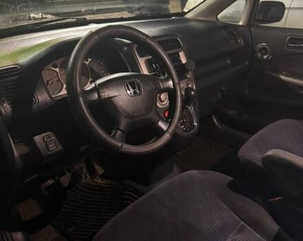 Сірий Хонда Стрім, об'ємом двигуна 2 л та пробігом 300 тис. км за 4000 $, фото 1 на Automoto.ua