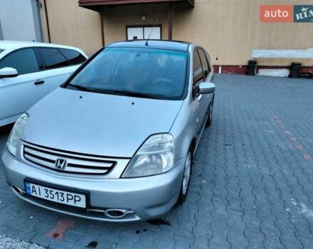 Сірий Хонда Стрім, об'ємом двигуна 2 л та пробігом 490 тис. км за 4800 $, фото 1 на Automoto.ua