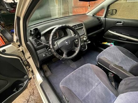 Сірий Хонда Стрім, об'ємом двигуна 2 л та пробігом 270 тис. км за 4900 $, фото 1 на Automoto.ua