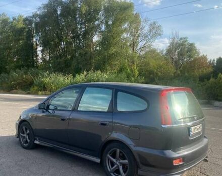 Сірий Хонда Стрім, об'ємом двигуна 2 л та пробігом 255 тис. км за 4400 $, фото 1 на Automoto.ua