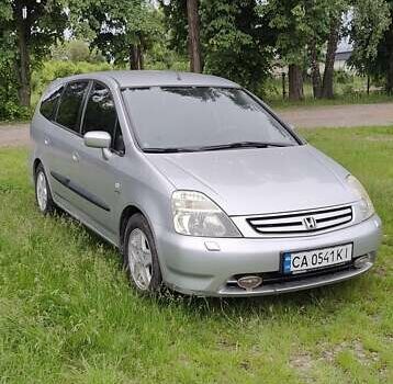 Сірий Хонда Стрім, об'ємом двигуна 2 л та пробігом 430 тис. км за 3500 $, фото 1 на Automoto.ua