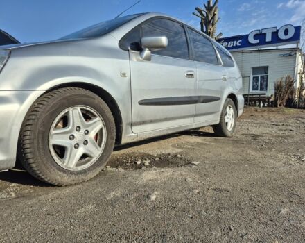Серый Хонда Стрим, объемом двигателя 2 л и пробегом 490 тыс. км за 4500 $, фото 1 на Automoto.ua