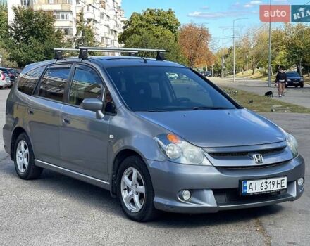 Серый Хонда Стрим, объемом двигателя 2 л и пробегом 399 тыс. км за 5700 $, фото 1 на Automoto.ua