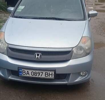 Серый Хонда Стрим, объемом двигателя 2 л и пробегом 213 тыс. км за 4100 $, фото 1 на Automoto.ua