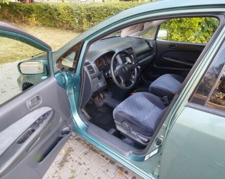 Зелений Хонда Стрім, об'ємом двигуна 2 л та пробігом 258 тис. км за 4500 $, фото 4 на Automoto.ua