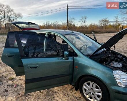 Зеленый Хонда Стрим, объемом двигателя 2 л и пробегом 145 тыс. км за 5000 $, фото 1 на Automoto.ua