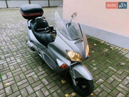 Серый Хонда Forza 250, объемом двигателя 0.25 л и пробегом 52 тыс. км за 1600 $, фото 1 на Automoto.ua