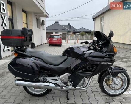 Фиолетовый Хонда NT 650V Deauville, объемом двигателя 0.65 л и пробегом 38 тыс. км за 3499 $, фото 11 на Automoto.ua