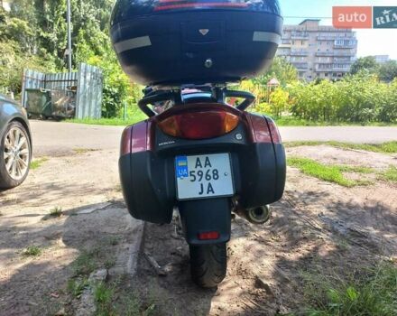 Красный Хонда NT 650V Deauville, объемом двигателя 0.65 л и пробегом 62 тыс. км за 4000 $, фото 3 на Automoto.ua