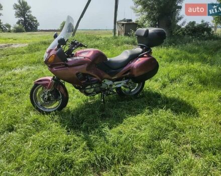 Красный Хонда NT 650V Deauville, объемом двигателя 0.65 л и пробегом 62 тыс. км за 4000 $, фото 2 на Automoto.ua
