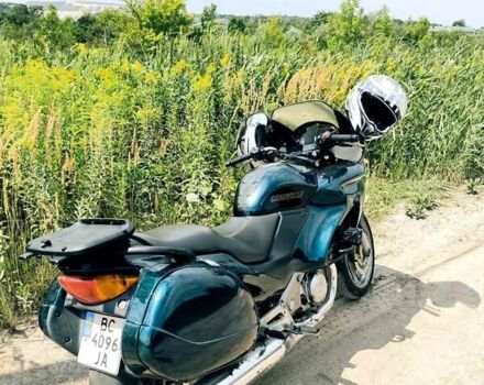 Зелений Хонда NT 650V Deauville, об'ємом двигуна 0.65 л та пробігом 55 тис. км за 3200 $, фото 9 на Automoto.ua