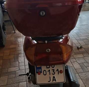 Красный Хонда SCV 100, объемом двигателя 0.1 л и пробегом 20 тыс. км за 630 $, фото 1 на Automoto.ua