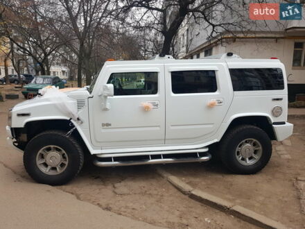 Белый Хаммер Н2, объемом двигателя 5.97 л и пробегом 80 тыс. км за 30000 $, фото 1 на Automoto.ua