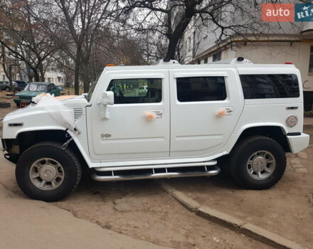Белый Хаммер Н2, объемом двигателя 5.97 л и пробегом 80 тыс. км за 30000 $, фото 1 на Automoto.ua