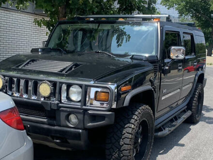 Черный Хаммер Н2, объемом двигателя 5.97 л и пробегом 189 тыс. км за 25000 $, фото 1 на Automoto.ua