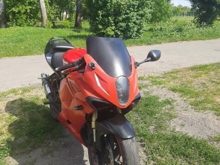 Хьюсонг GT 250R 2008 в Чутове на Automoto.ua Красный Хьюсонг GT 250R, объемом двигателя 0.25 л и пробегом 43 тыс. км за 1680 $, фото 1 на Automoto.ua