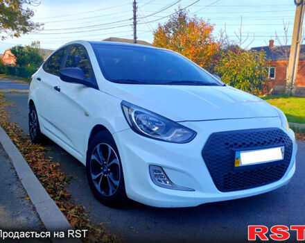 Білий Хендай Акцент, об'ємом двигуна 1.4 л та пробігом 65 тис. км за 8490 $, фото 6 на Automoto.ua