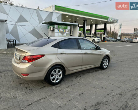 Бежевый Хендай Акцент, объемом двигателя 1.4 л и пробегом 175 тыс. км за 5400 $, фото 6 на Automoto.ua