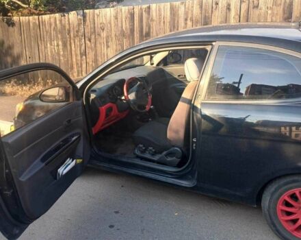 Черный Хендай Акцент, объемом двигателя 1.6 л и пробегом 148 тыс. км за 3300 $, фото 4 на Automoto.ua