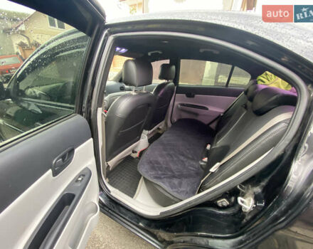 Черный Хендай Акцент, объемом двигателя 1.4 л и пробегом 343 тыс. км за 5000 $, фото 13 на Automoto.ua