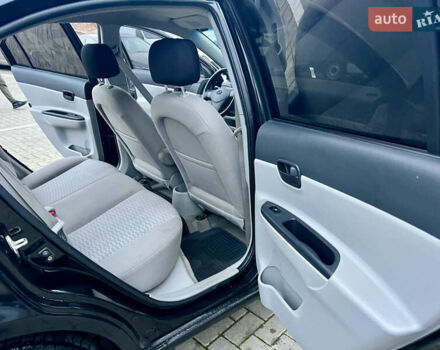 Черный Хендай Акцент, объемом двигателя 1.4 л и пробегом 221 тыс. км за 4950 $, фото 36 на Automoto.ua