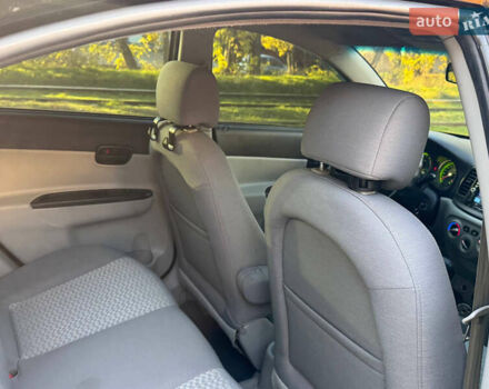 Черный Хендай Акцент, объемом двигателя 1.4 л и пробегом 128 тыс. км за 5800 $, фото 58 на Automoto.ua