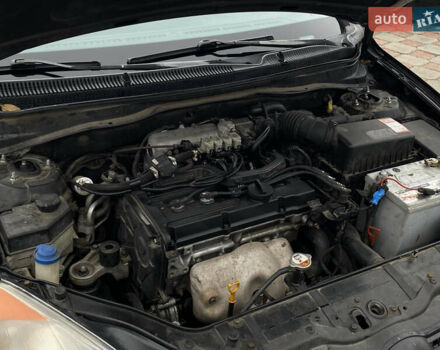 Черный Хендай Акцент, объемом двигателя 1.4 л и пробегом 215 тыс. км за 4799 $, фото 13 на Automoto.ua