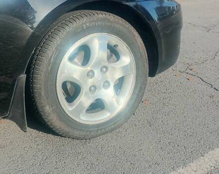 Черный Хендай Акцент, объемом двигателя 1.49 л и пробегом 204 тыс. км за 5280 $, фото 9 на Automoto.ua