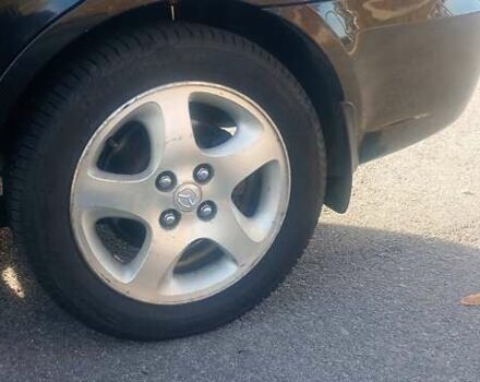 Черный Хендай Акцент, объемом двигателя 1.49 л и пробегом 204 тыс. км за 5280 $, фото 33 на Automoto.ua