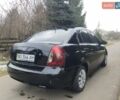 Черный Хендай Акцент, объемом двигателя 1.4 л и пробегом 400 тыс. км за 3000 $, фото 6 на Automoto.ua