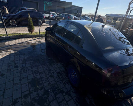 Черный Хендай Акцент, объемом двигателя 1.4 л и пробегом 210 тыс. км за 4050 $, фото 2 на Automoto.ua