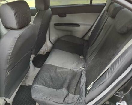 Черный Хендай Акцент, объемом двигателя 1.6 л и пробегом 215 тыс. км за 5200 $, фото 4 на Automoto.ua