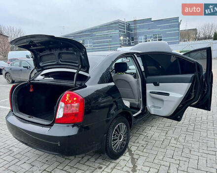 Черный Хендай Акцент, объемом двигателя 1.4 л и пробегом 221 тыс. км за 4950 $, фото 24 на Automoto.ua