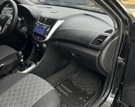 Хендай Акцент 2011 в Полтаве на Automoto.ua Черный Хендай Акцент, объемом двигателя 1.4 л и пробегом 186 тыс. км за 5999 $, фото 26 на Automoto.ua