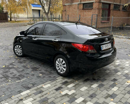 Хендай Акцент 2011 в Полтаве на Automoto.ua Черный Хендай Акцент, объемом двигателя 1.4 л и пробегом 186 тыс. км за 5999 $, фото 13 на Automoto.ua