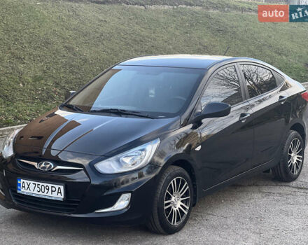 Черный Хендай Акцент, объемом двигателя 1.4 л и пробегом 141 тыс. км за 7500 $, фото 1 на Automoto.ua