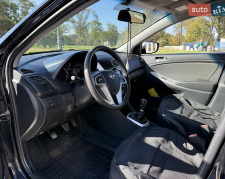 Черный Хендай Акцент, объемом двигателя 1.4 л и пробегом 207 тыс. км за 6099 $, фото 5 на Automoto.ua