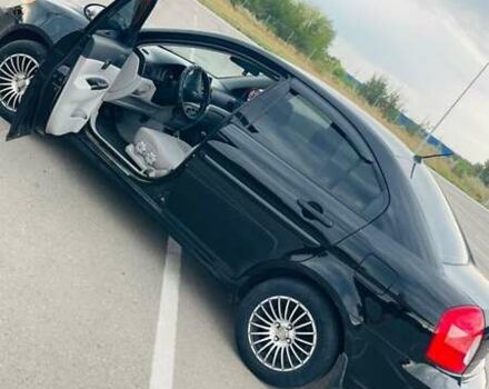 Черный Хендай Акцент, объемом двигателя 1.4 л и пробегом 250 тыс. км за 4999 $, фото 1 на Automoto.ua