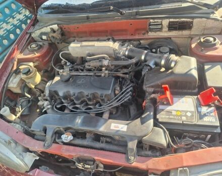 Красный Хендай Акцент, объемом двигателя 1.5 л и пробегом 150 тыс. км за 2700 $, фото 4 на Automoto.ua